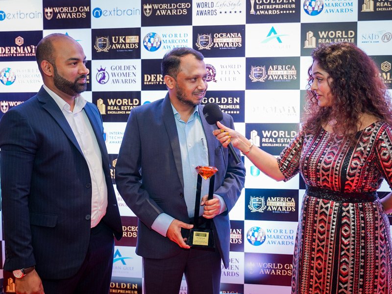 Award recipients celebrating at an International Restaurant Awards ceremony